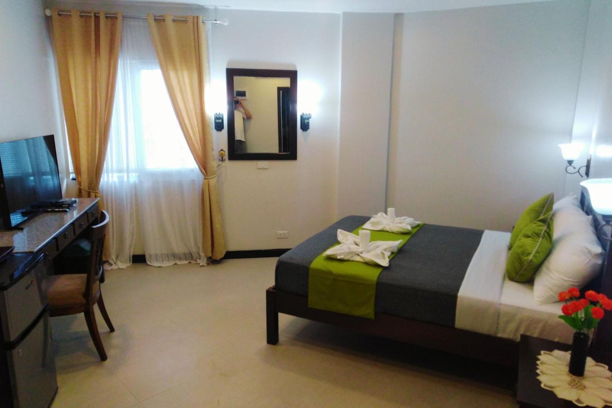 Venezia Suites Hotel Iloilo Rom bilde