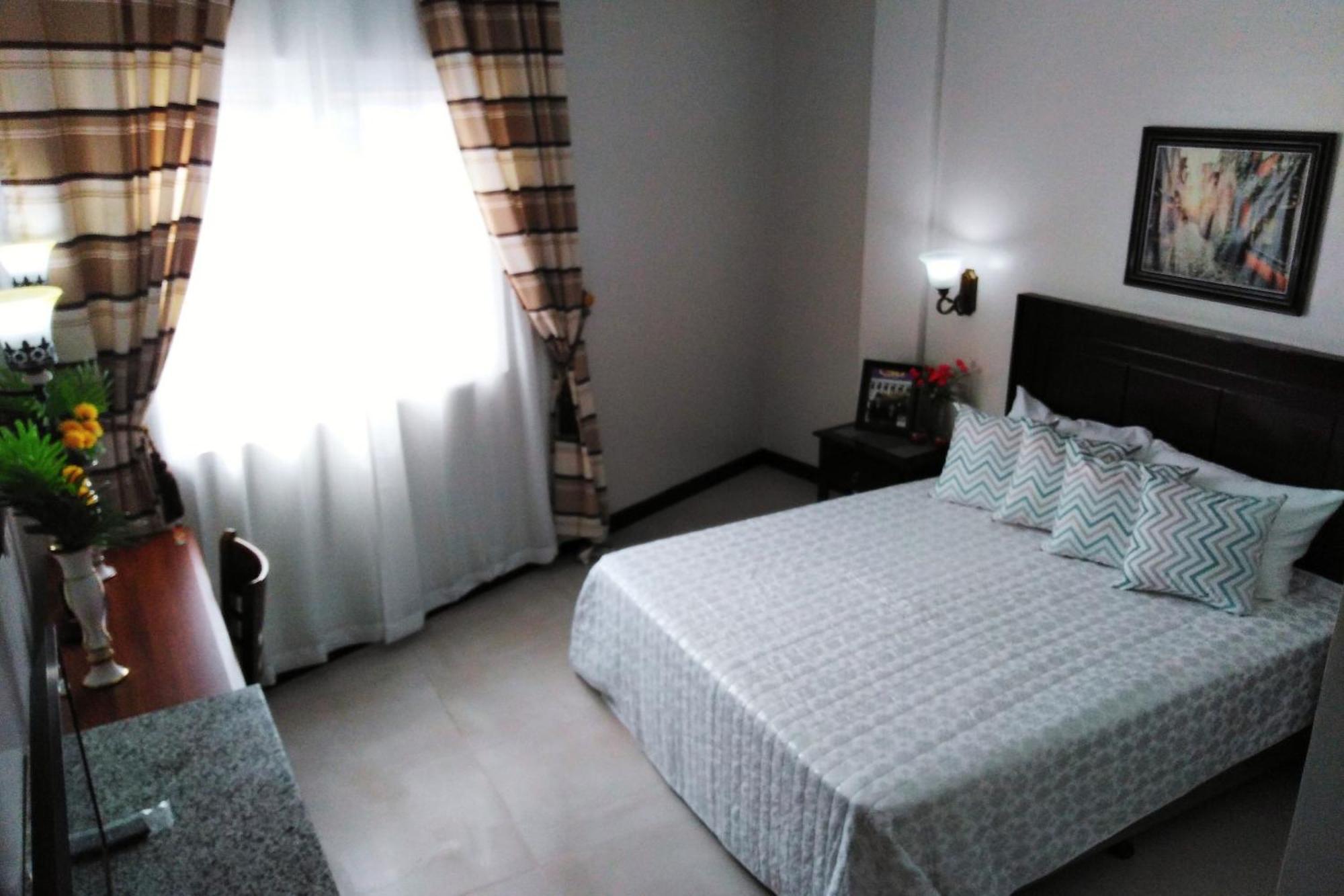 Venezia Suites Hotel Iloilo Rom bilde
