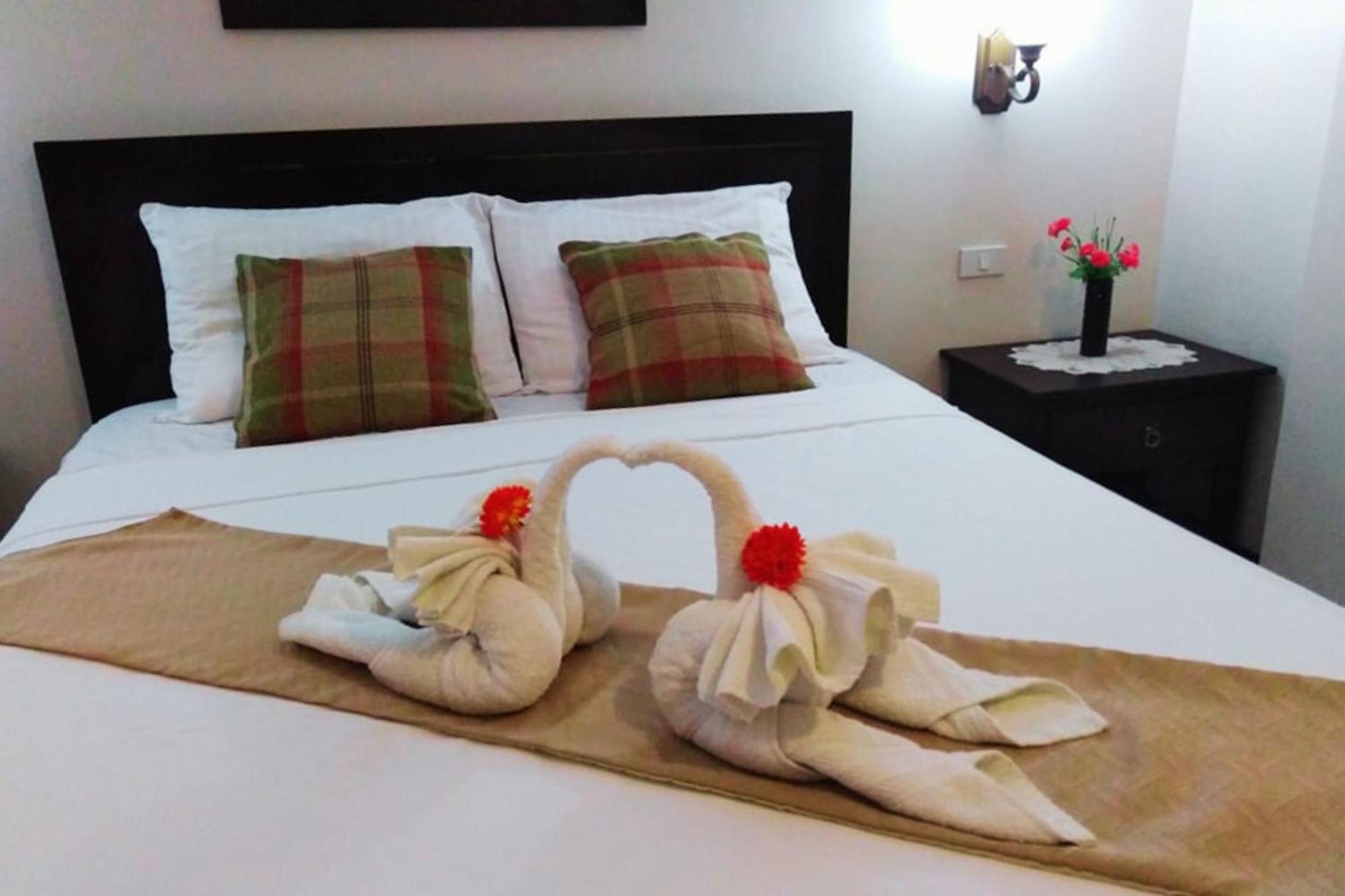 Venezia Suites Hotel Iloilo Rom bilde