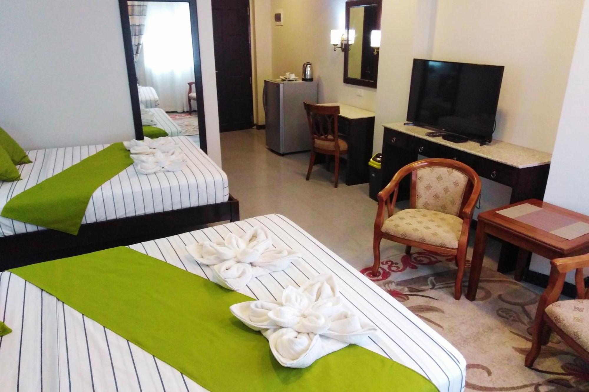 Venezia Suites Hotel Iloilo Rom bilde
