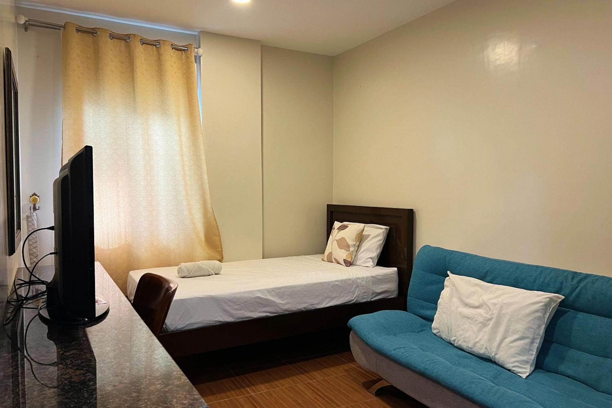 Venezia Suites Hotel Iloilo Rom bilde
